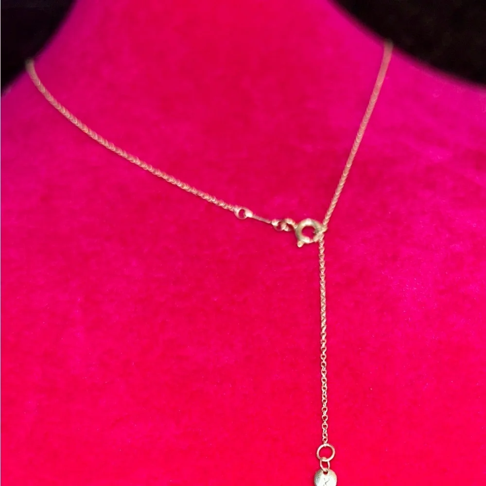 Sold! Tiffany & Co. Silver Arrow Necklace. Hallmarked:
"T & Co. - Picture 9 of 10